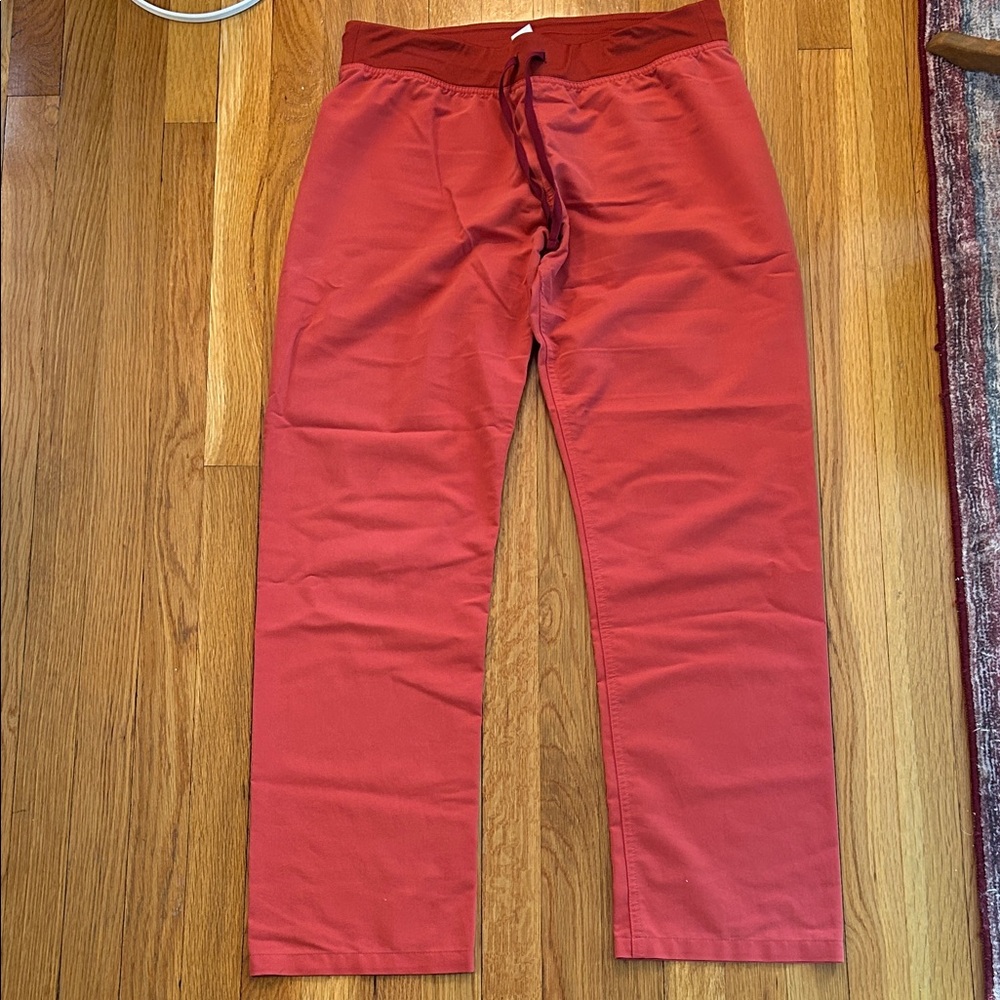 Figs coral colored Livingston scrub pants and matching top